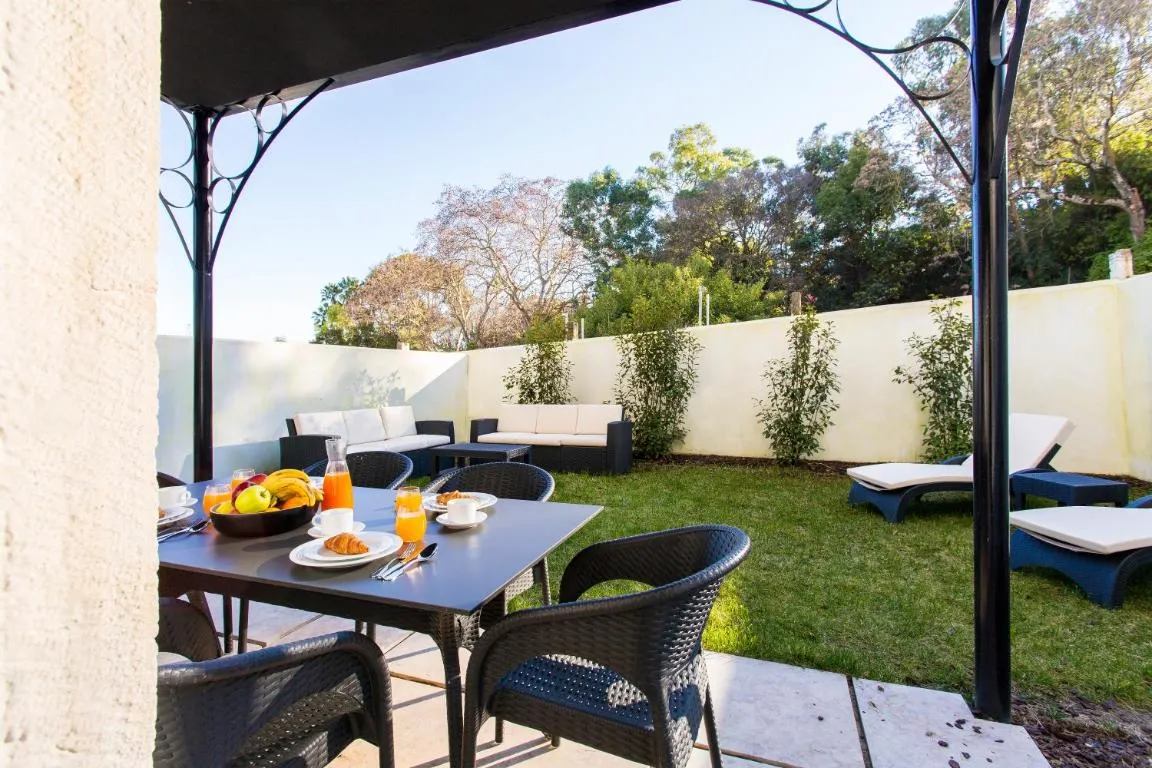 Image of JOIVY Stunning 2BR Apt with garden, by the Avenida subway and Botanical Garden of Lisbon